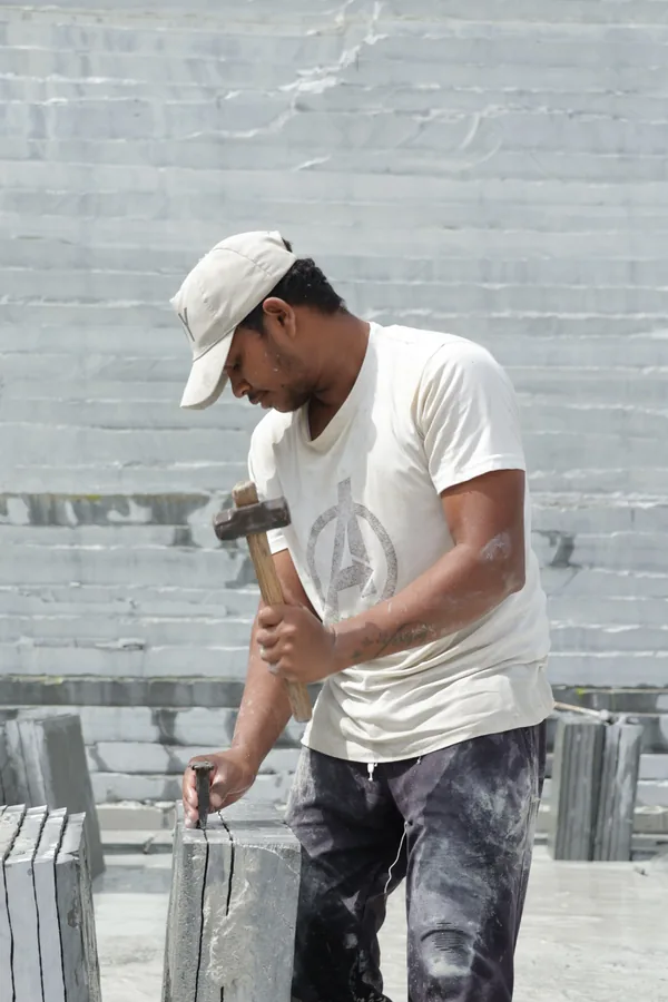 An edge being finished by hand at the polishing yard